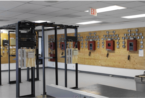 Telephone and Structured Cabling Systems in Foreground. Fire Alarm Systems in Background. 